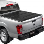 UnderCover Flex Hard Folding Truck Bed Tonneau Cover | FX51020 | Fits 2022 Nissan Frontier w/ or w/o Utili-Track System 5' 0" Bed (59.5")